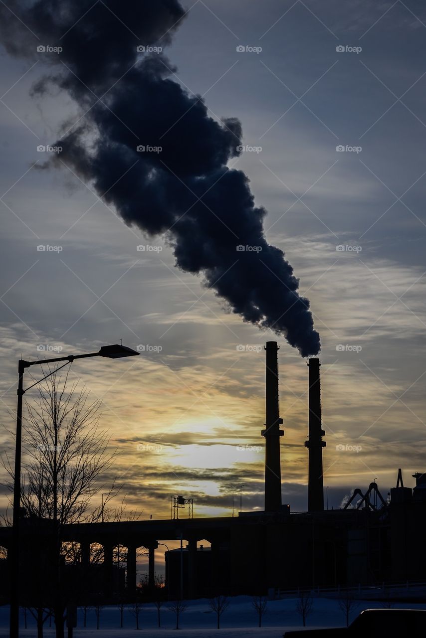 Smokestacks against the sunset