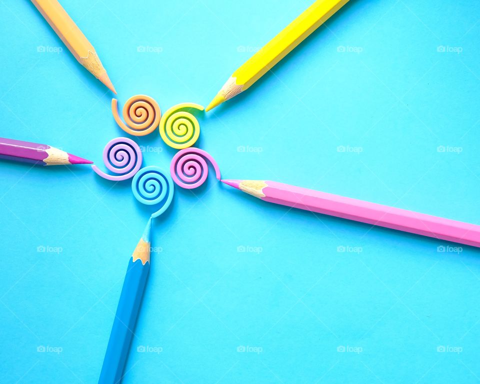 Colorful composition of pencils and swirls 