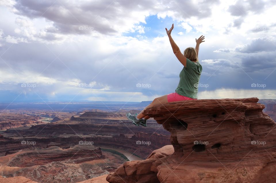 Girl celebrates climb atop Dead Horse State Park