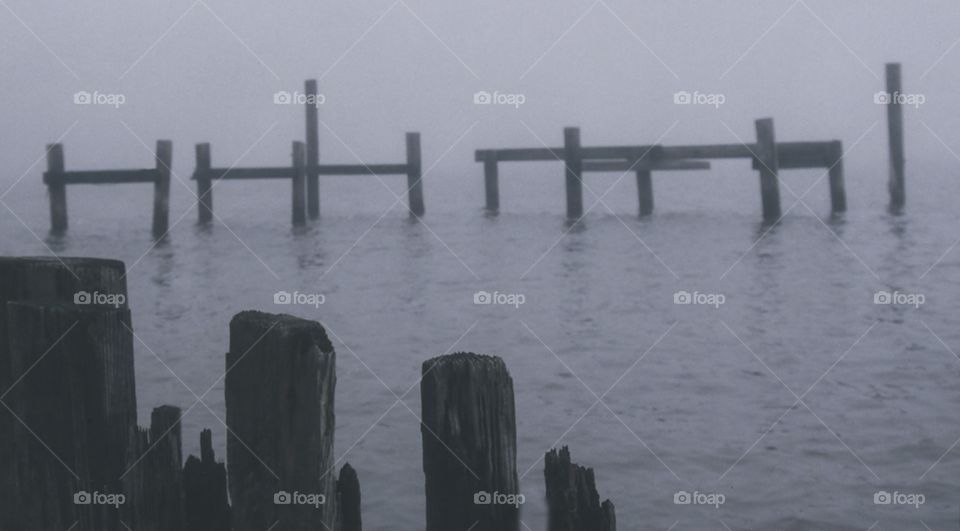Old dock with fog
