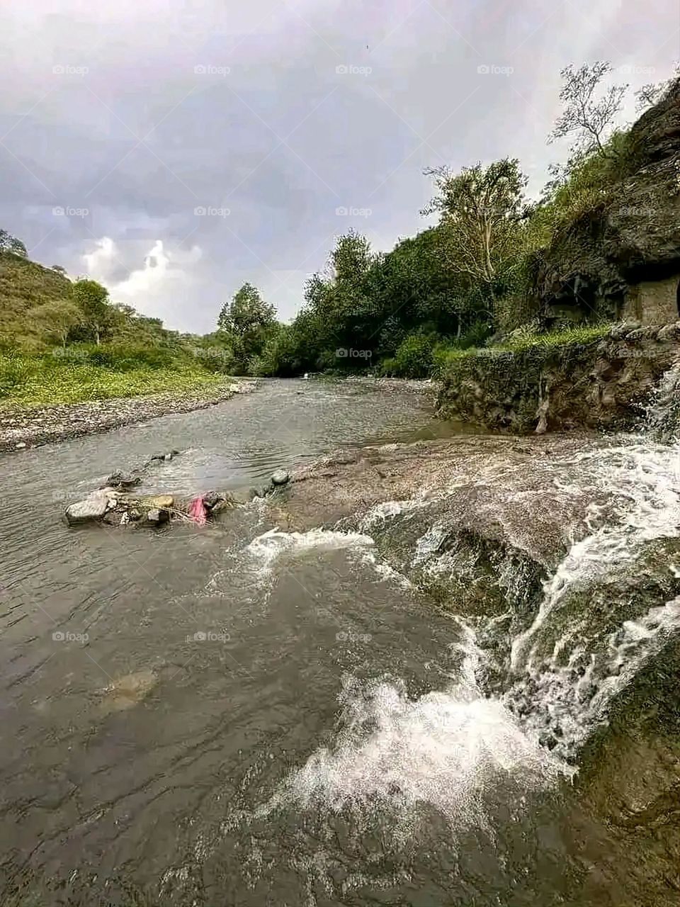 Glory be to God, the magnificent and picturesque view and the natural green trees are a view that is nothing more wonderful than it