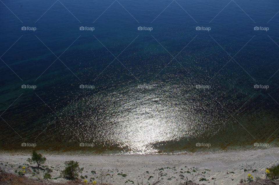 High angle view of sea and beach