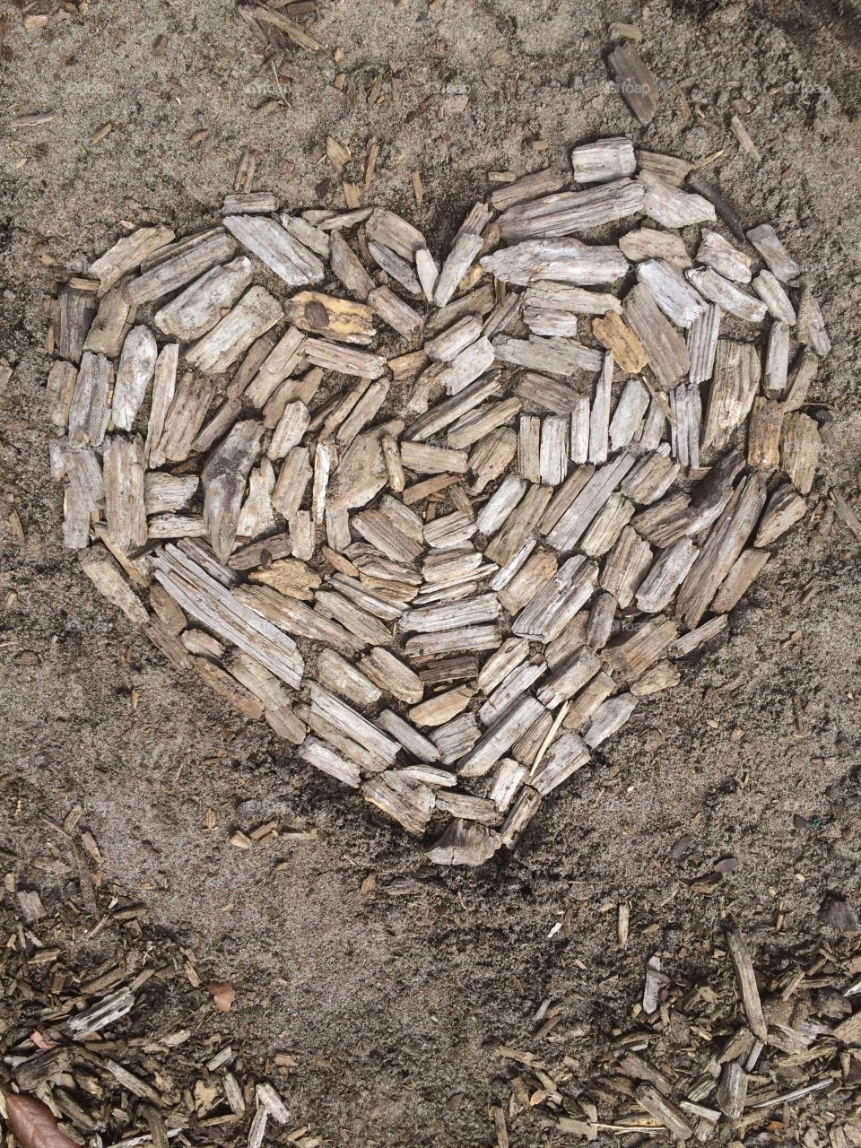 Michaelangelo have seen great heroes hidden in the white blocks of stone brought to him. A builder sees a magnificent house in the heap of materials on a construction site. What did you see in the wood chips scattered on a playground? A happy story, I hope.