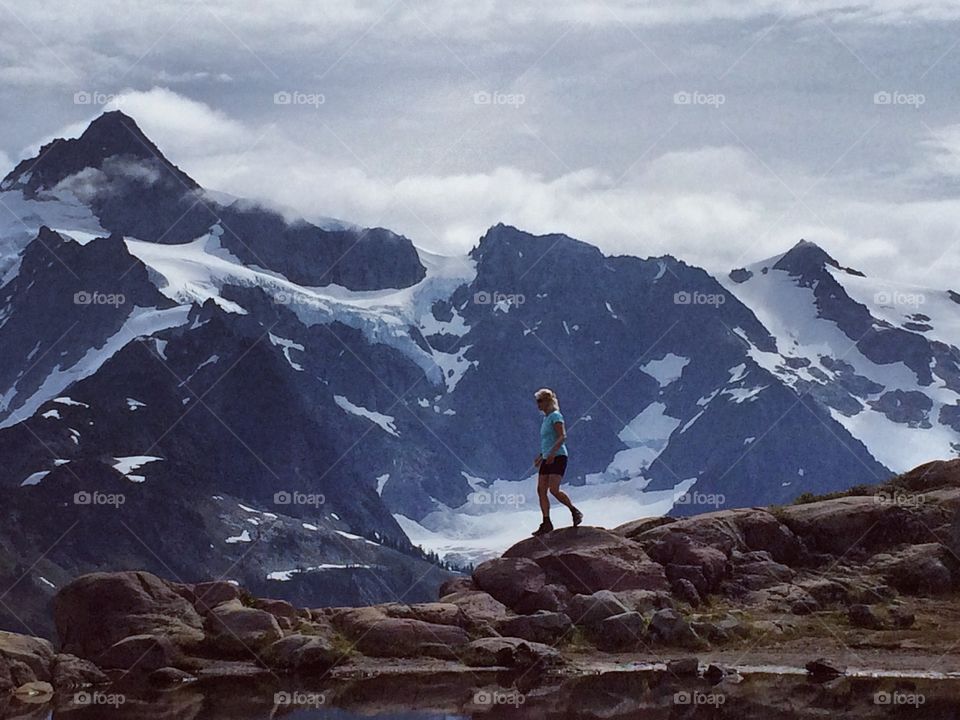 Hiking atop Mount Baker on a Summer's day, which is located in the Pacific Northwest of Washington State 