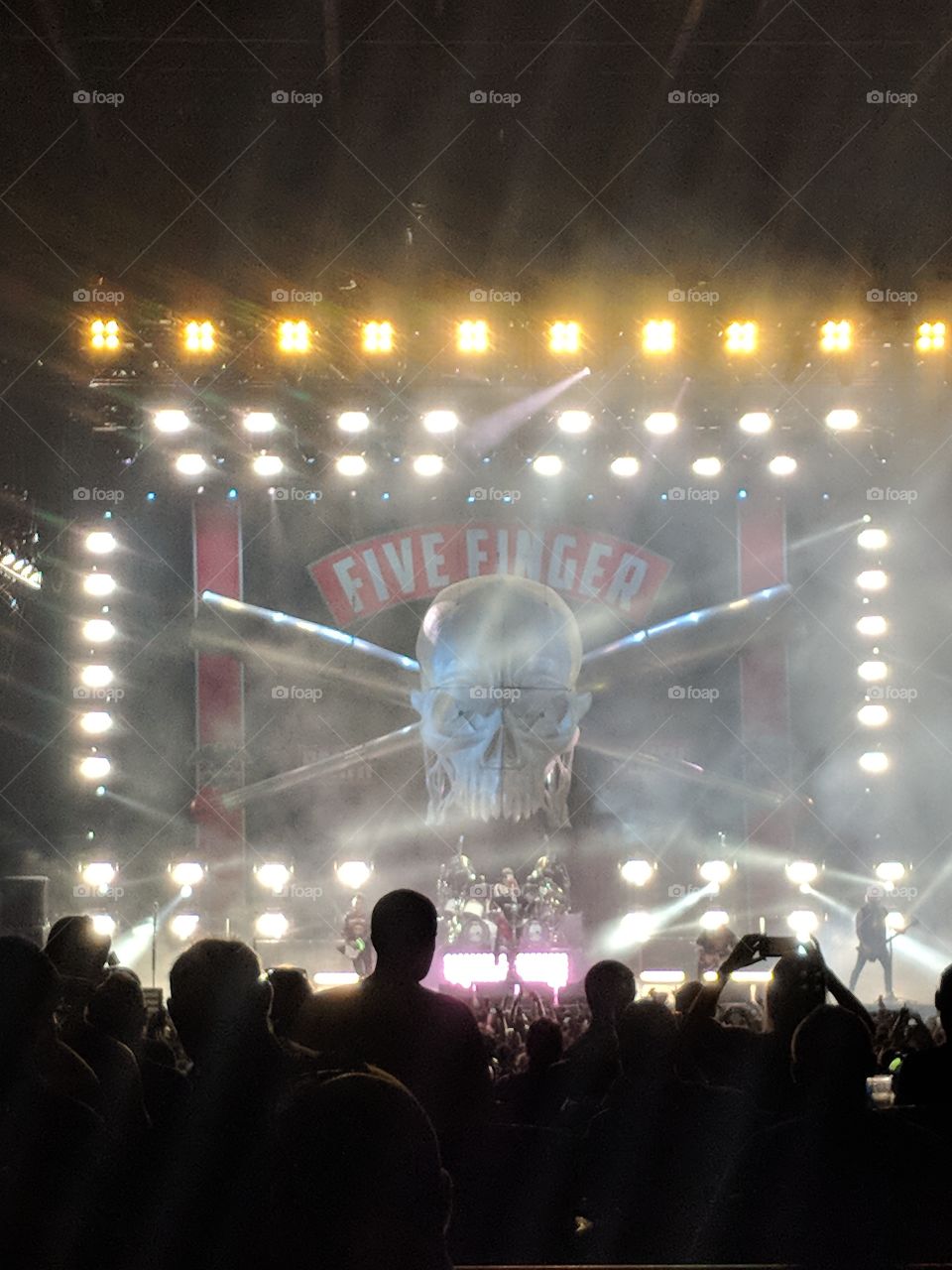 bright white lights cast the stage in a surreal light at the Aug 11, 2018 Five Finger Death Punch concert in Tampa, fl