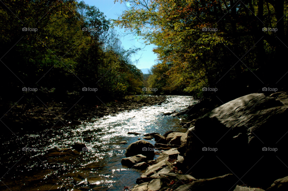 river rocks by refocusphoto