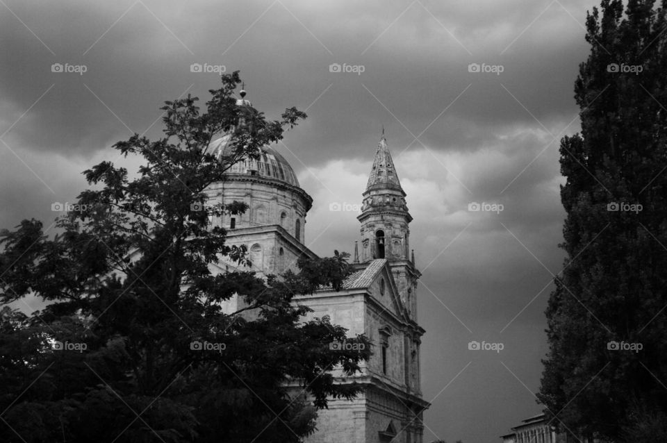 Italian church, over cloudy sky 