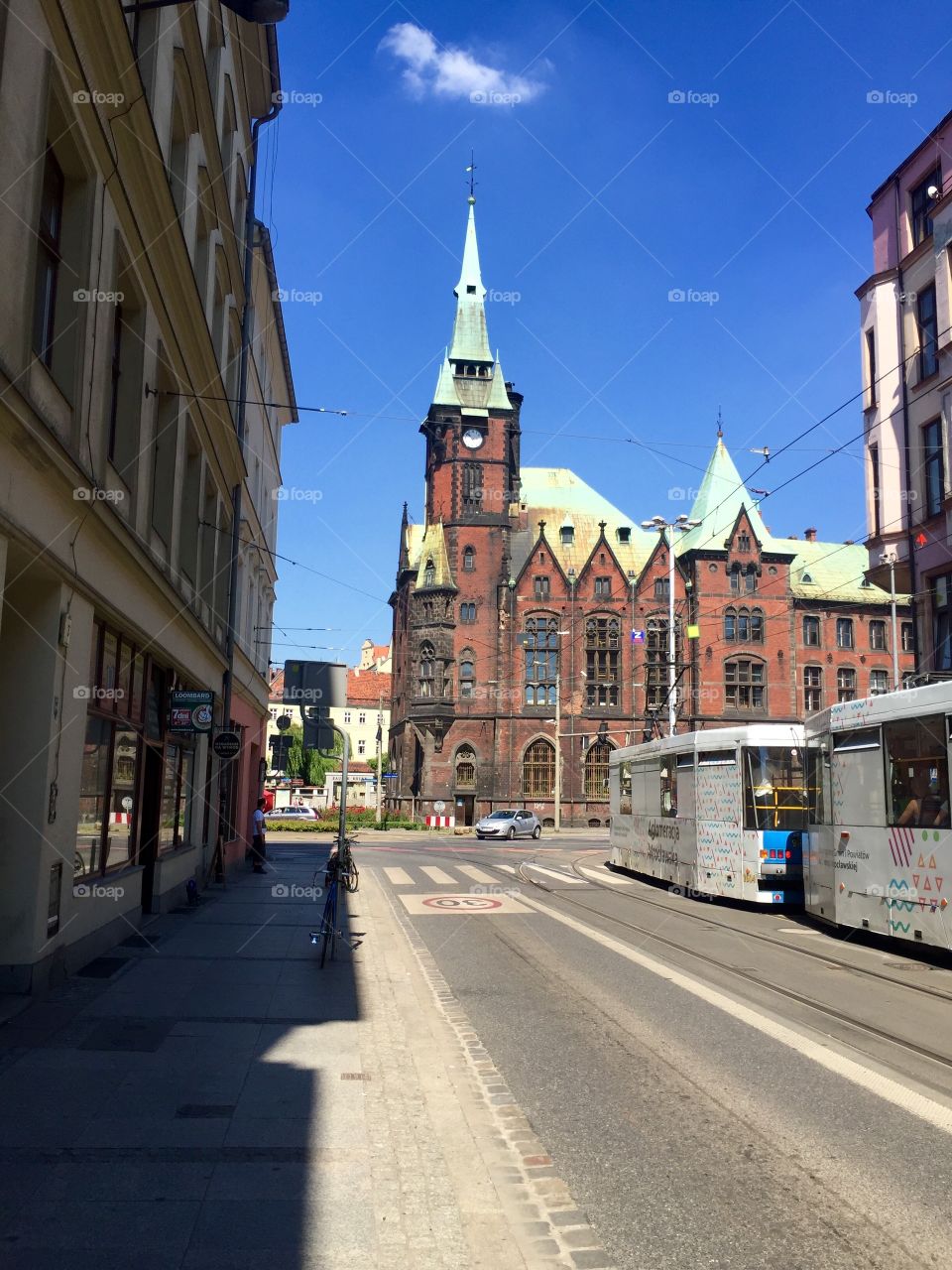 An ancient University library in Wroclaw and a modern tram