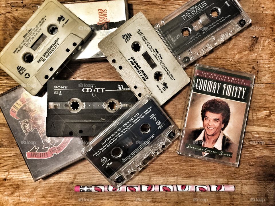Old cassette tapes and a pencil 