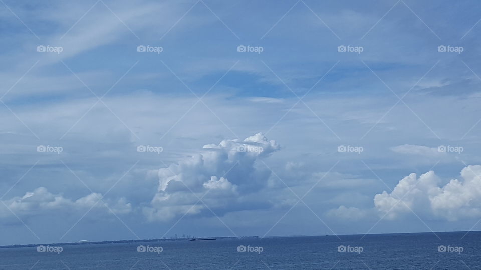 The ocean and the sky come together in harmony.