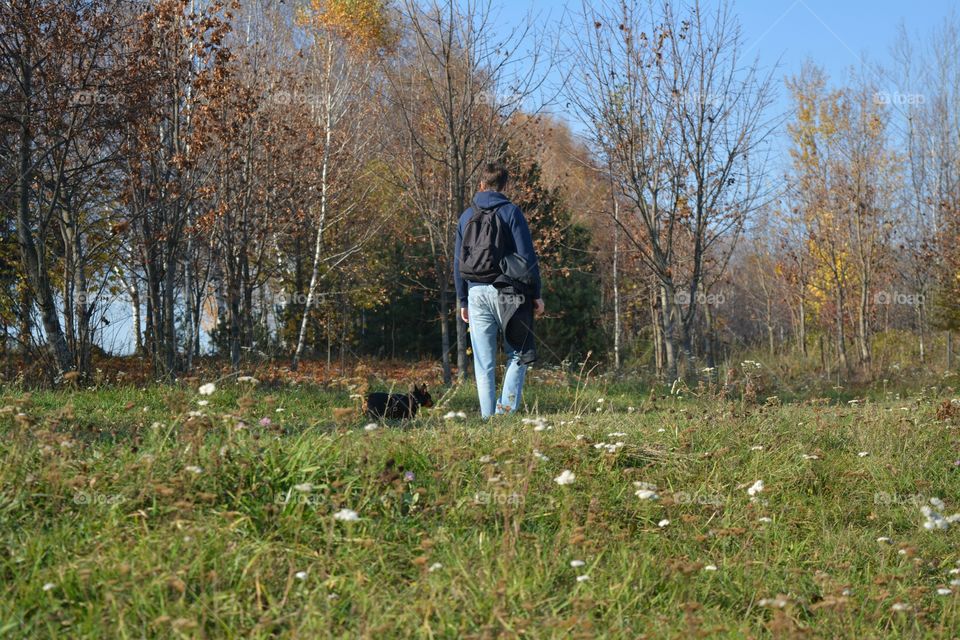 morning walking person with dog autumn time