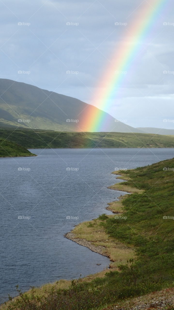 Rainbow over a lake in Alaska.