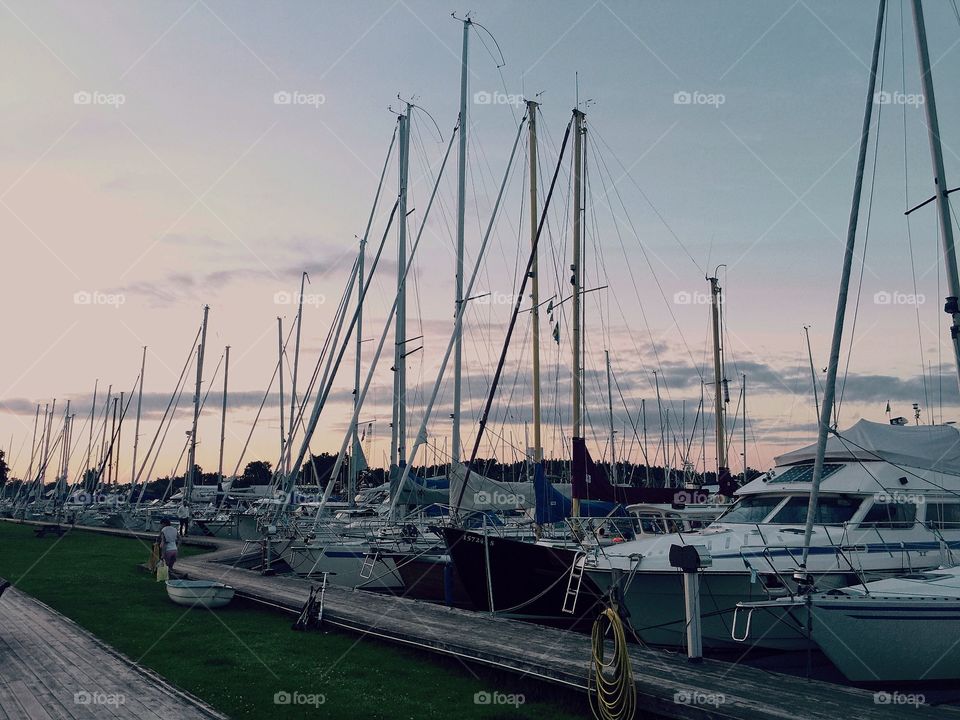 In the docks. Private yachts docks in sunset