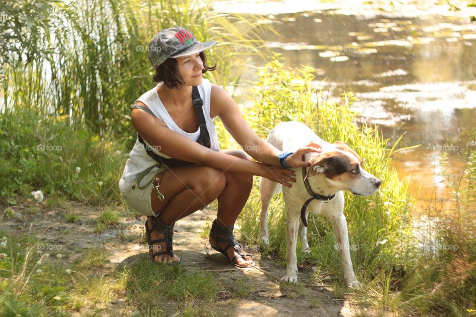 Pretty brunette with funny dog