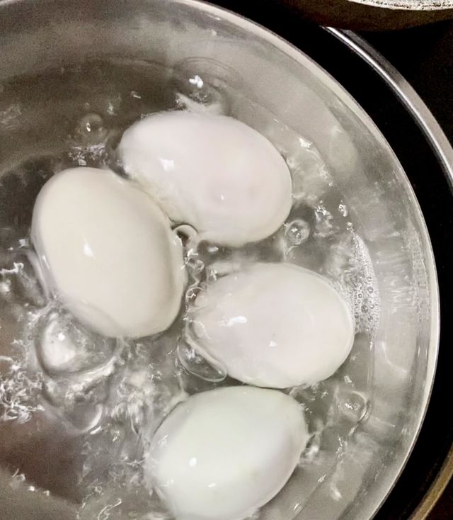 Salted eggs (duck’s) in boiling water