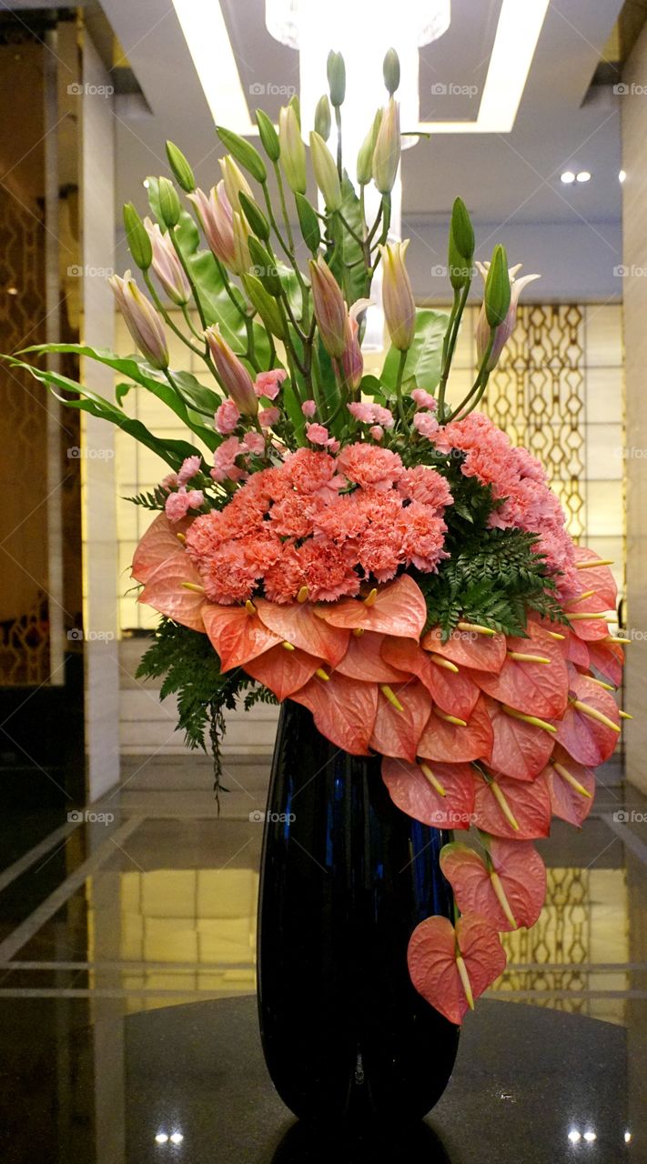 pink carnation lily and flamingo flower in vase 