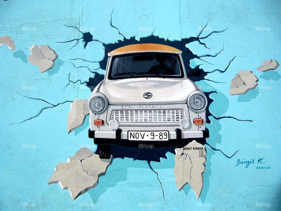 A car painted on an old wall in Columbia Street