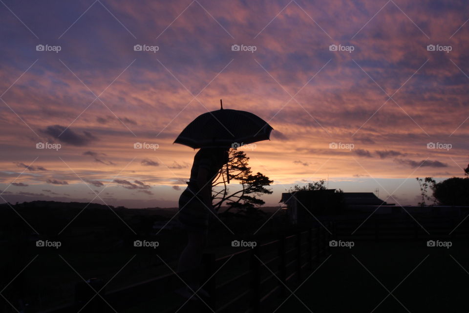 Umbrella in sunset