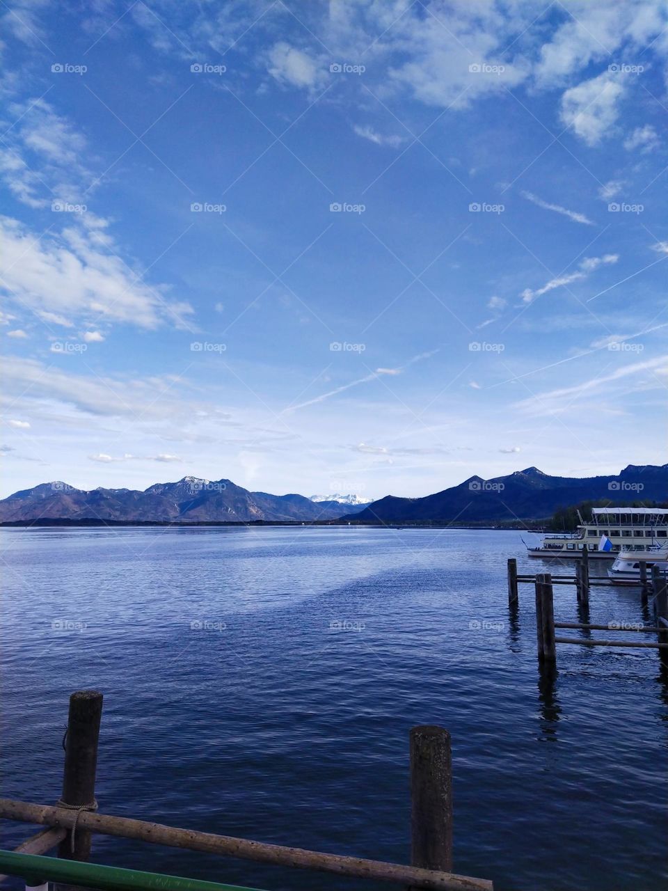 Beautiful blue lake with mountains in the background