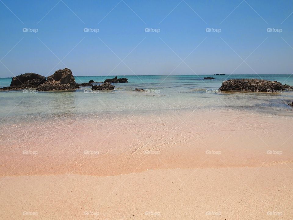 Pink sands, blue waters