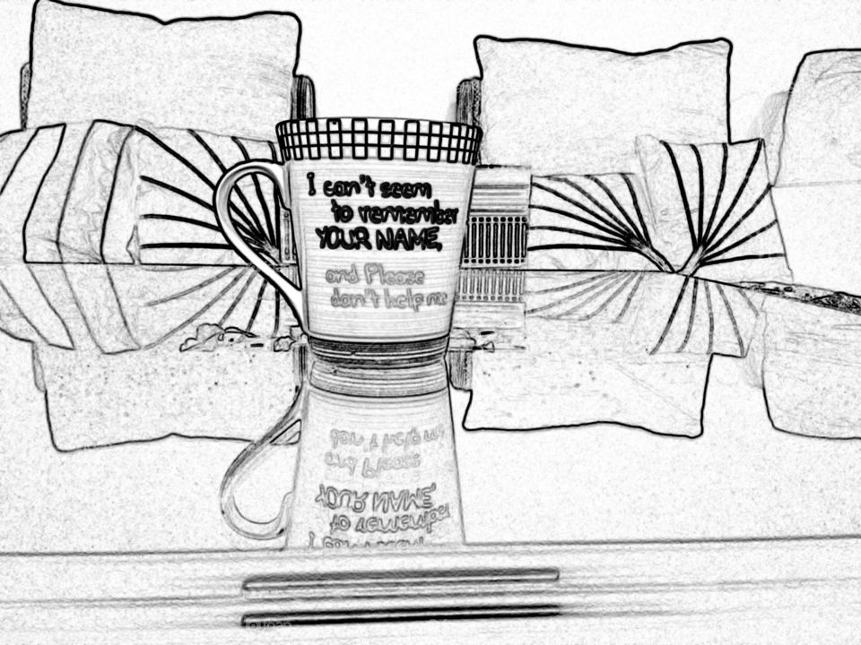 Pencil sketch of a glass table with designer mug lying over it with reflection of objects