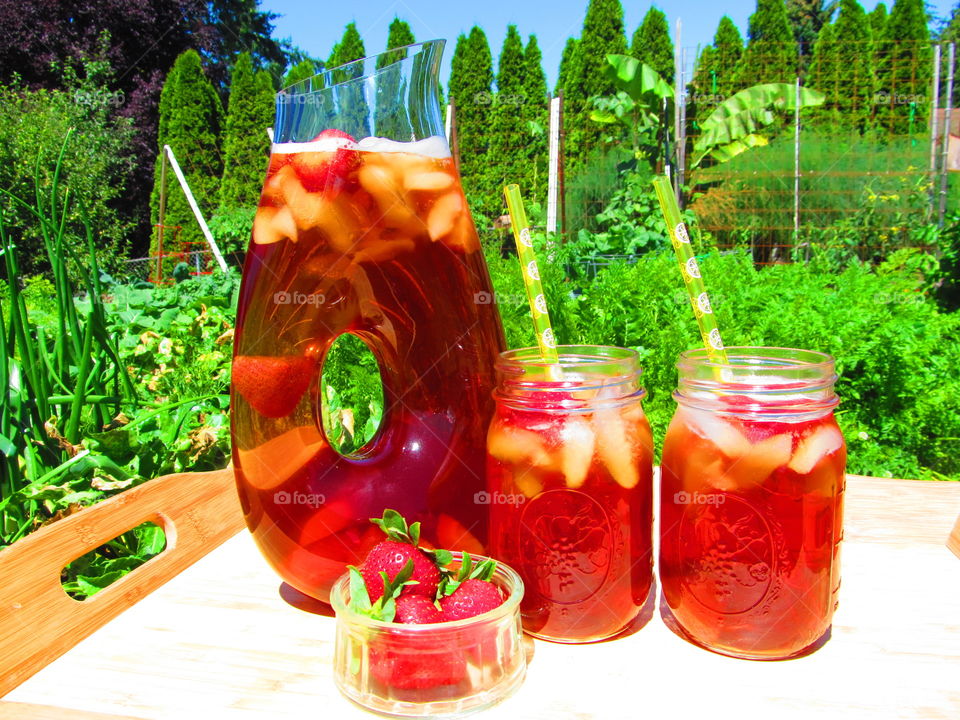 Strawberry juice in glass jar