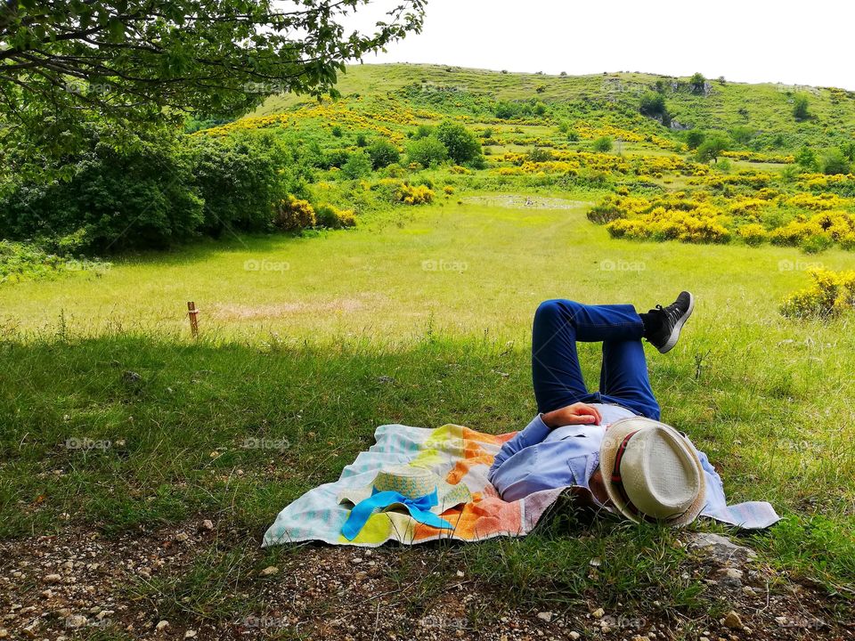 Man relaxes in the countryside