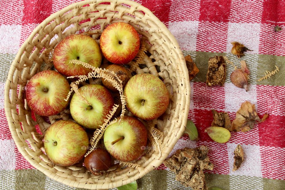 Apples in a round straw basket