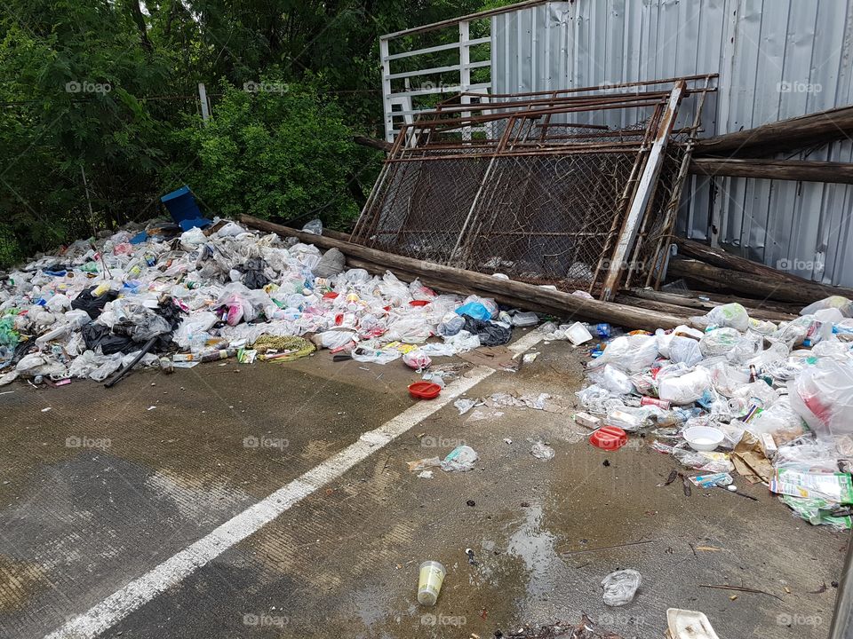 illegal wild dump, pile of garbage outdoor on the street