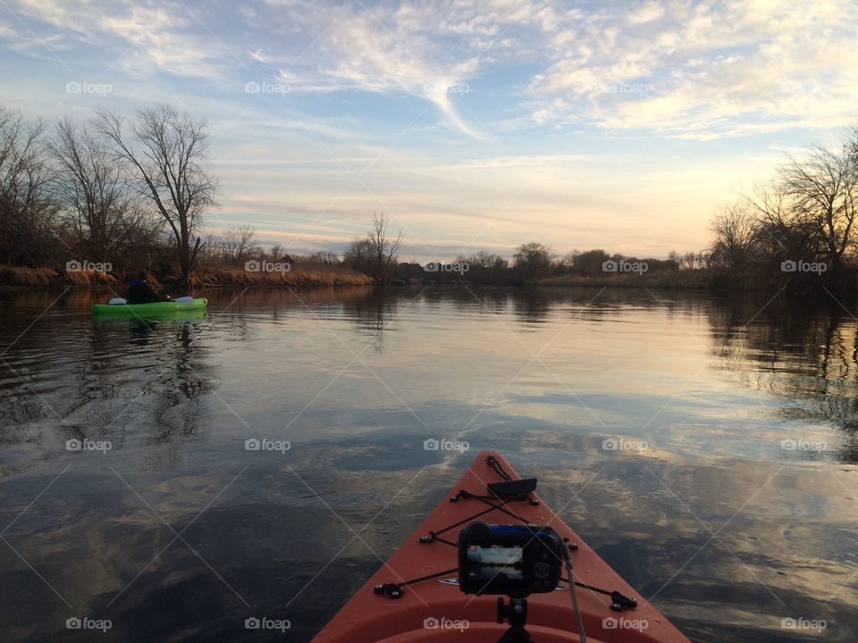 Kayak's view during morning over water