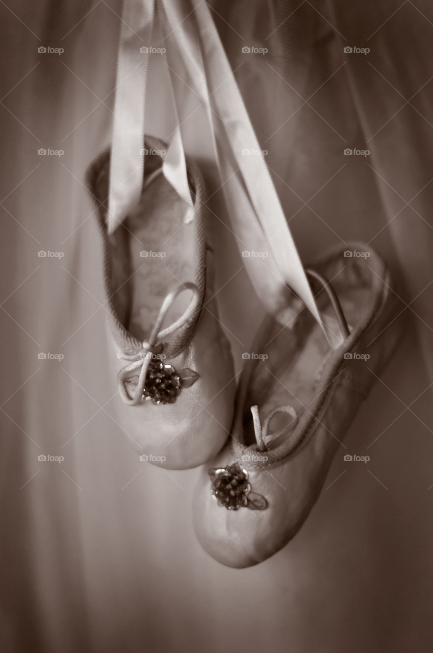 Dance slippers. Sepia tone image of dance slippers