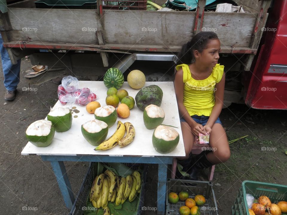 fruit stand. evert morning in costa rica we would get breakfast at our favorite fruit stand from this girl and her father 