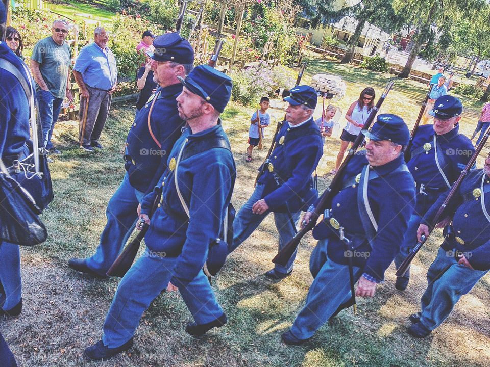 Group of guard marching in park