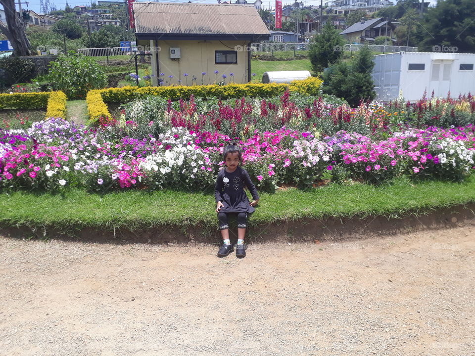 A girl in the flower garden