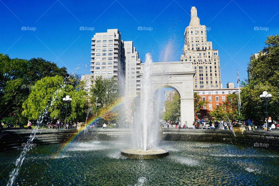 The fountain in Washington Square Park, gives off cool refreshing vibes and a rainbow to delight. 