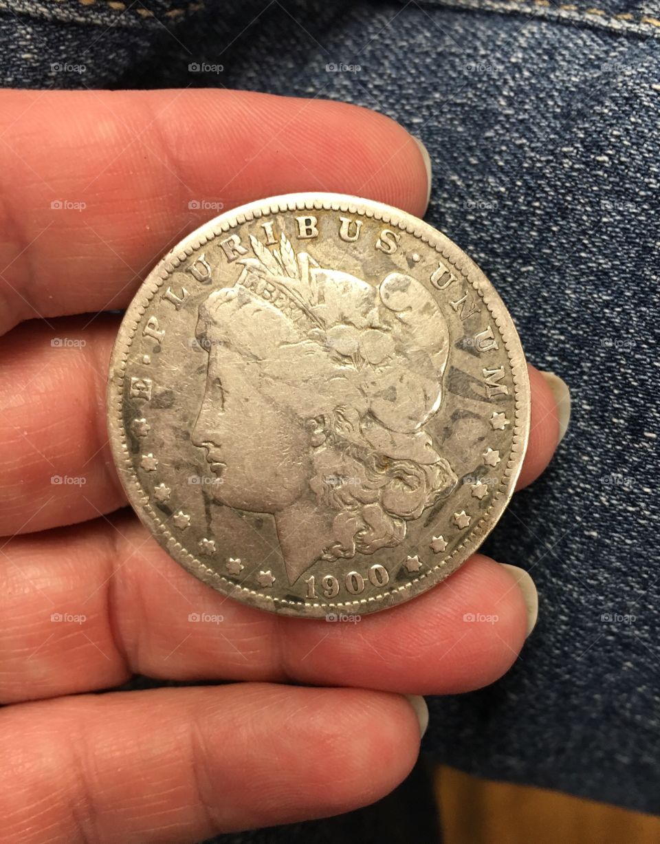 Morgan silver dollar. 