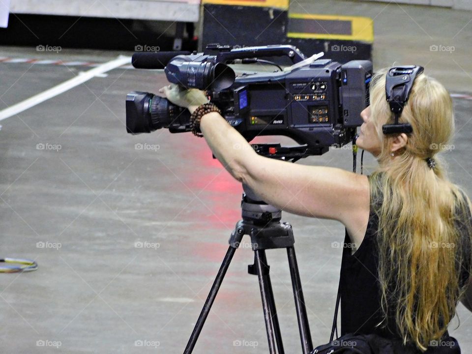 Video Creator focuses the camera during the bishop’s ordination 