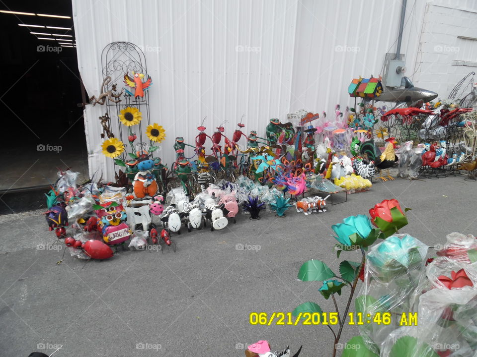 steel roses. This is a picture of some yard decorations that were on display at a flea market in Weatherford Texas