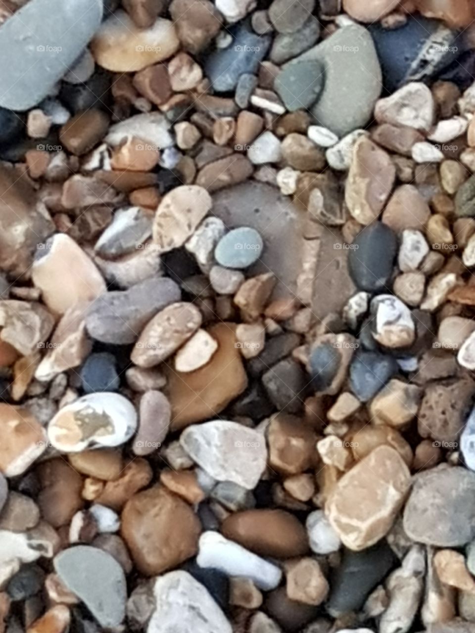 Lots of different loose stones. The stones are next to the Sea. Named De Maasvlakte, The Netherlands.