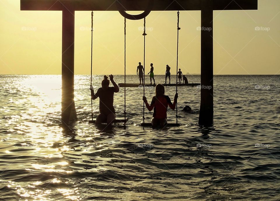 Swinging in the sea