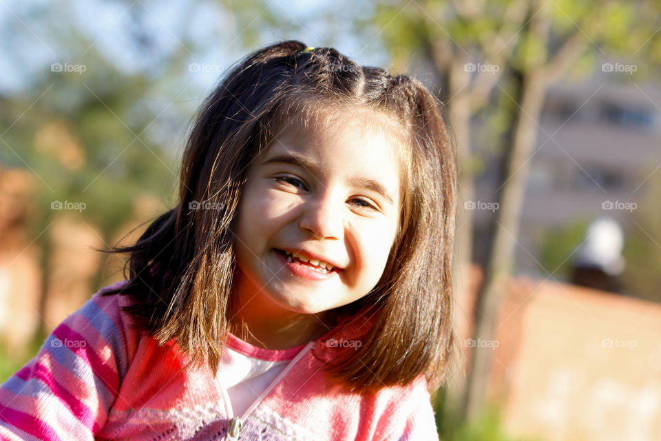 Portrait of a cute smiling girl