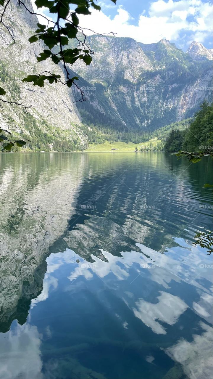 Peaceful lake Obersee with reflection from surrounding mountains, beautiful landscape in the alps of Germany 