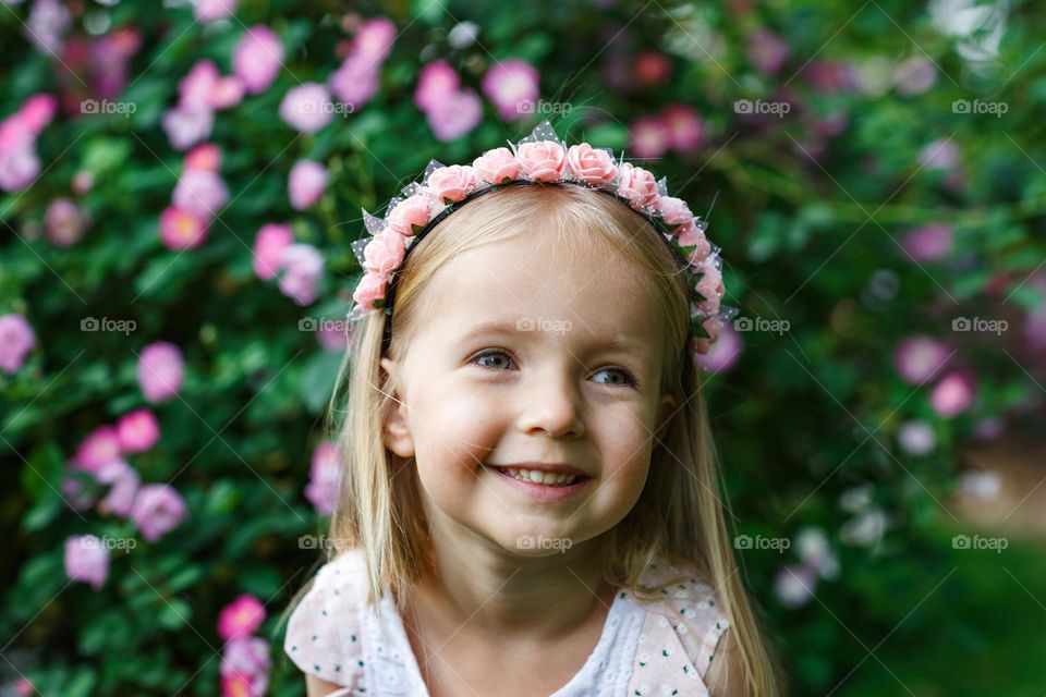 Little Caucasian feeling happiness outdoor 