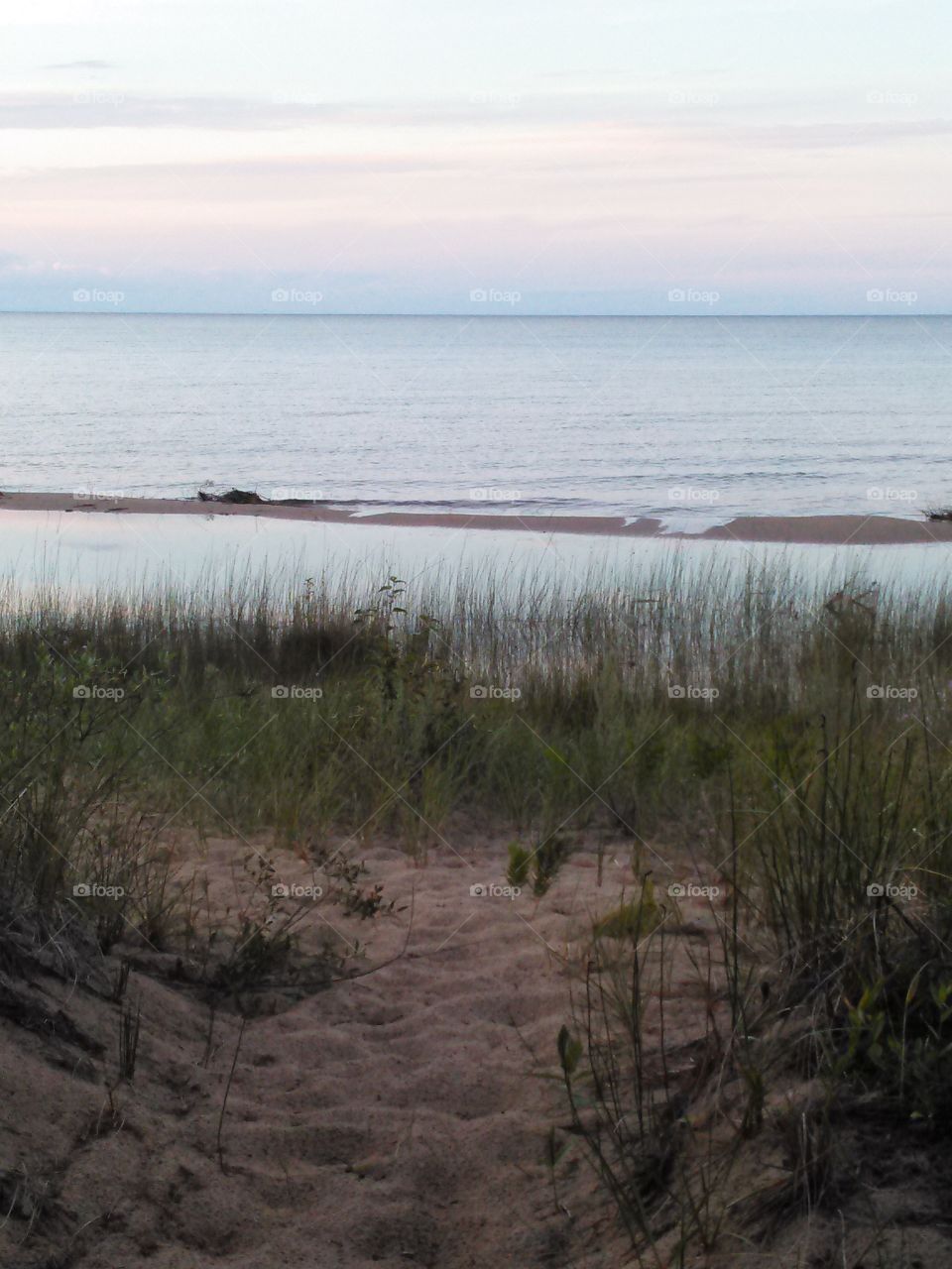 Lake At Dusk. Lake Huron, Hammond Bay just as the sun is beginning to set.