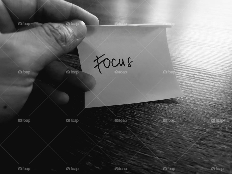 Motivational quotes on a small piece of paper