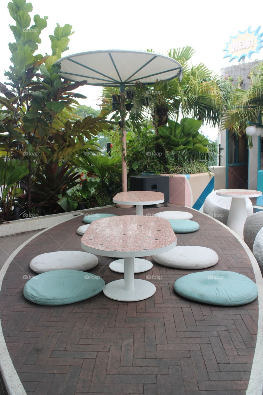 On the floor dining table under the tent