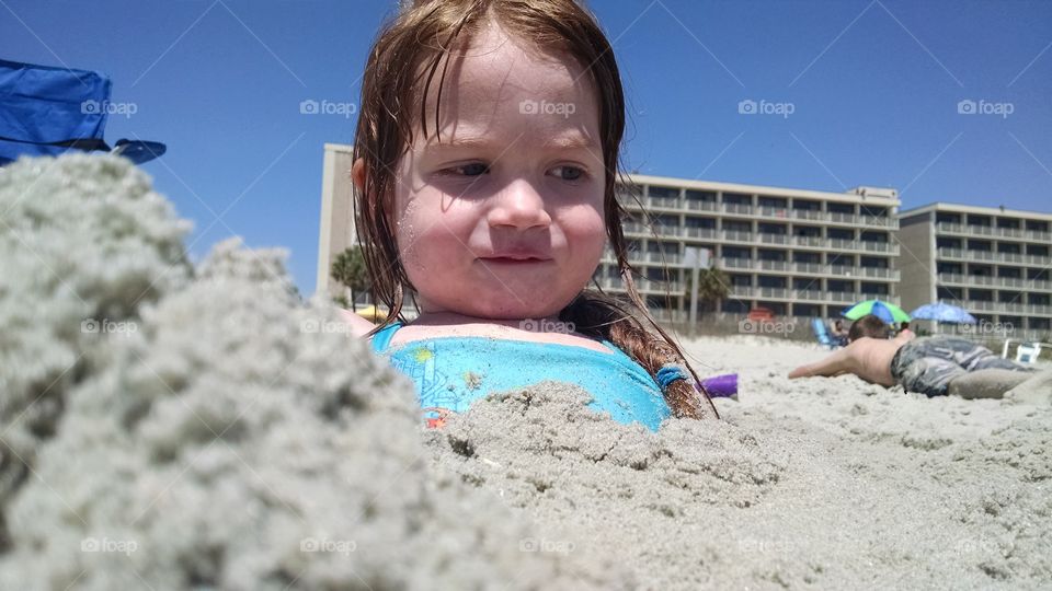 Playing in the sand. my daughter playing in the sand