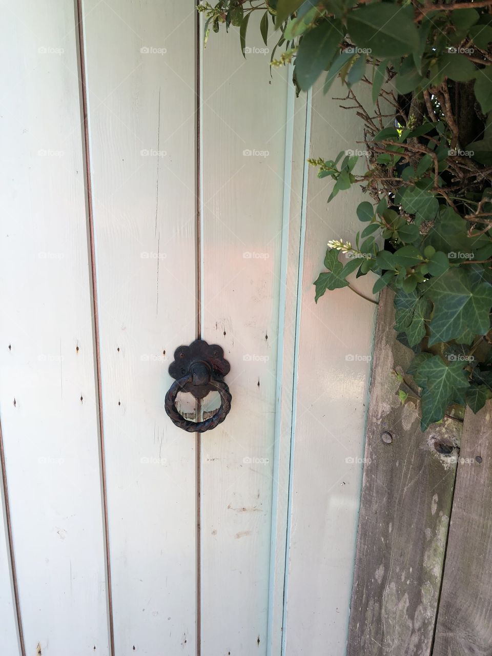 I am loving my photos of doors with authentic door knobs, this is another nice example.