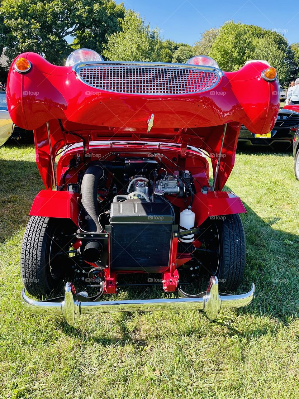 Under the hood. The soul of the Sprite, it’s engine. The power behind the two seat classic roadster. 