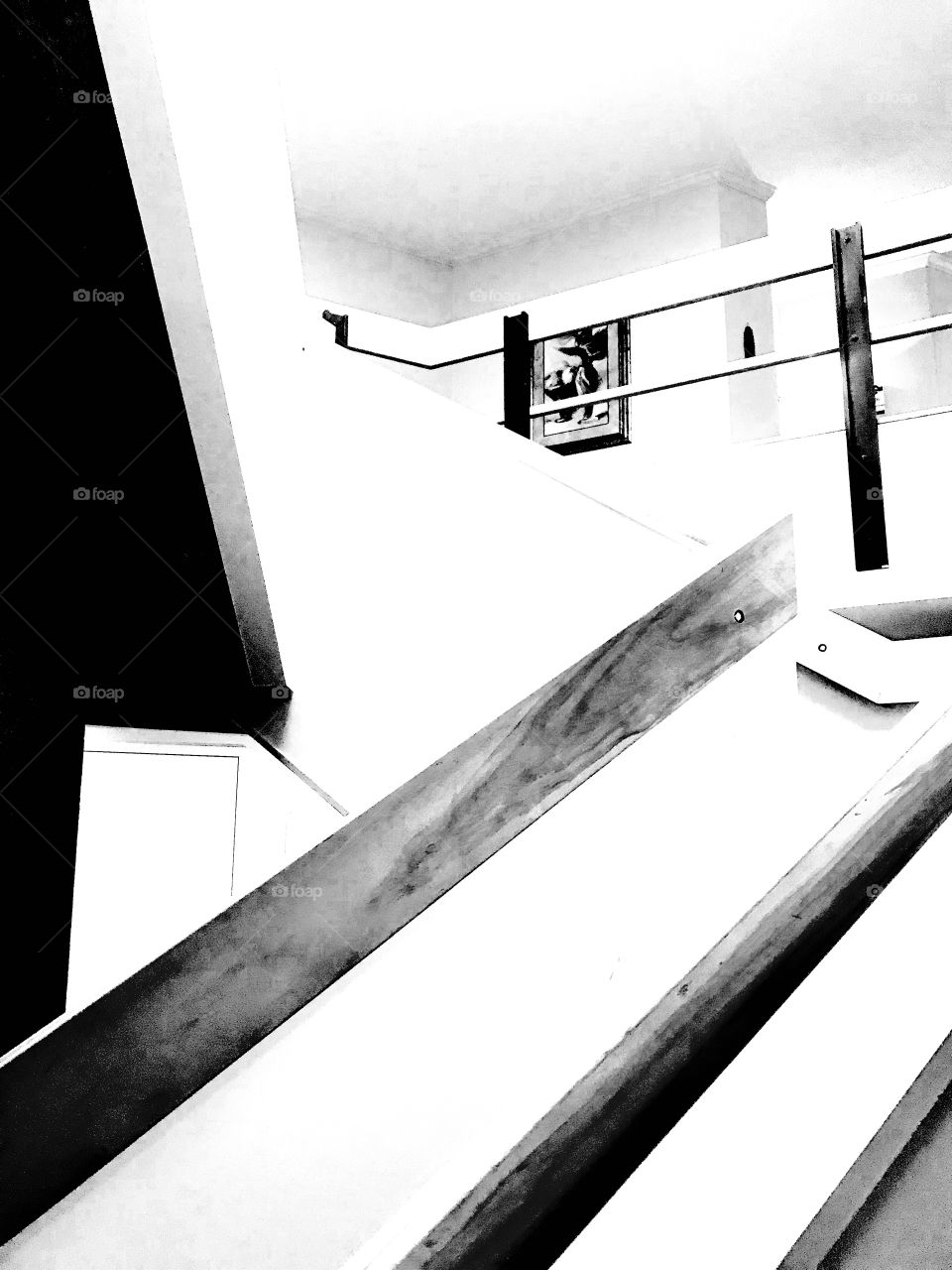Architectural black and white photo of a stairway with a turn in it makes for a fun photo! 